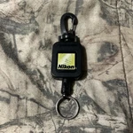 Nikon Retractable Rangefinder Tether. Fixed Price $12.00.