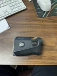 Bushnell Tour V6 Patriot Pack Rangefinder - Black/gray/orange (202301P). Fixed Price $200.00.