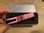 Scotty Cameron My Girl Of Carlsbad Pink Clip Pivot Divot Tool. Fixed Price $199.00.