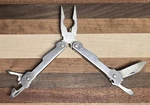 American Camper Pocket Tool Metal Folding Pliers Screw Driver Bottle Opener.... Fixed Price $8.00.
