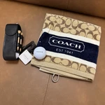 Coach Golf Ball Holder And Towel Set. Fixed Price $65.00.