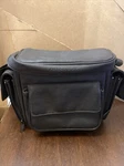 Bushnell Padded Camera Case With Straps And Many Pockets Black Soft Leather. Fixed Price $11.99.